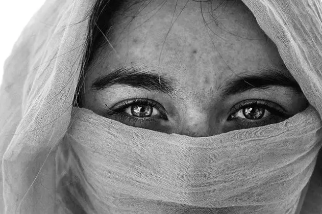A veiled face.